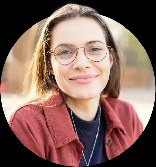 Woman with glasses smiling